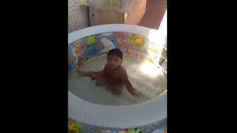 'Video thumbnail for Baby swimming at the pool'