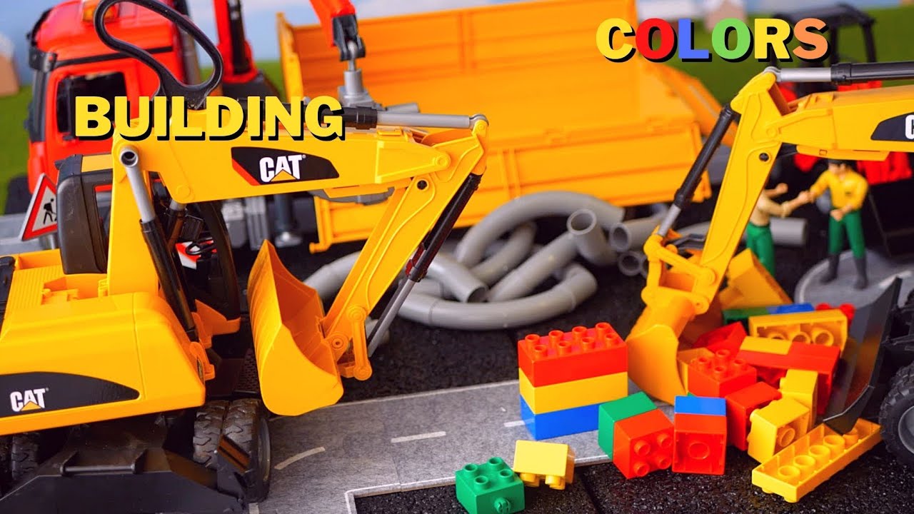 'Video thumbnail for BUILDING WITH DIFFERENT MATERIALS & COLORS: Bruder construction toys Excavator CAT Delta Loader'