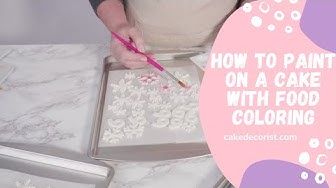 'Video thumbnail for How To Paint On A Cake With Food Coloring'